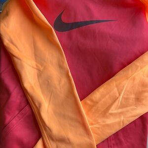 Nike Red and Orange Raincoat Vibrant Colorblock Design